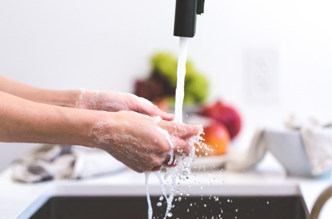 person washing hands