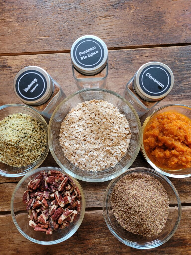 low sugar pumpkin spice oatmeal ingredients and spices in glass dishes